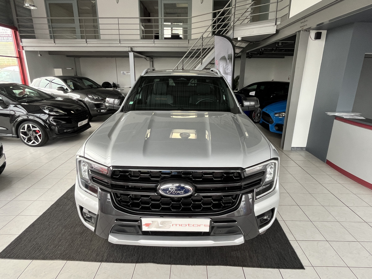 FORD RANGER SUPER CABINE WILDTRAK 2,0 TDCI BI-TURBO 205 BVA10 4X4 GPS CAMERA 360 ATTELAGE REGULATEUR LIMITEUR APPLE CARPLAY PACK TECHNOLOGIE FEUX LED KEYLESS CHAUFFAGE STATIONNAIRE ETAT NEUF